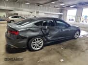 ✅ 2023 Audi A5 Sportback S line Premium Plus • VIN: WAUFACF53PA036679 • Лот: 82481735. Опубликован ранее на Copart с пробегом 21 125 миль. Бесплатный доступ к архиву аукционных продаж из США и подробный отчёт об истории автомобиля на DreamBid. Изображение 3.