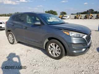 2019 Hyundai Tucson SE z VIN KM8J2CA43KU935537, wystawiony jako Copart lot #85107585 z przebiegiem 159 592 mil mil oraz Czysty tytuł • Clean title. Historia ofert i sprzedaży dostępna na DreamBid. Obrazek 4.