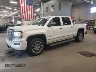 ✅ 2018 GMC Sierra 1500 Denali • VIN: 3GTU2PEC6JG132202 • Lot: 86255295. Listed on Copart with 170,664 mi. Free auction sales archive from the USA and detailed vehicle history report at DreamBid. Image 1.