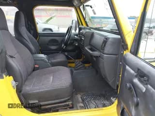 ✅ 2002 Jeep Wrangler Sport • VIN: 1J4FA49S32P710999 • Лот: 43721287. Опубликован ранее на IAAI с пробегом 159 956 миль. Бесплатный доступ к архиву аукционных продаж из США и подробный отчёт об истории автомобиля на DreamBid. Изображение 5.