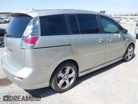 ✅ 2007 Mazda 5 Touring • VIN: JM1CR29L070133007 • Lot: 42467906. Listed on IAAI with 130,921 mi. Free auction sales archive from the USA and detailed vehicle history report at DreamBid. Image 4.