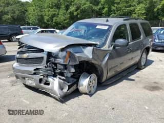 2007 Chevrolet Tahoe LS with VIN 1GNFC13C97J399791, listed as a Copart auction lot 64393345 with 230,655 mi miles and Salvage title. Bid and sale history available at DreamBid. Image 1.