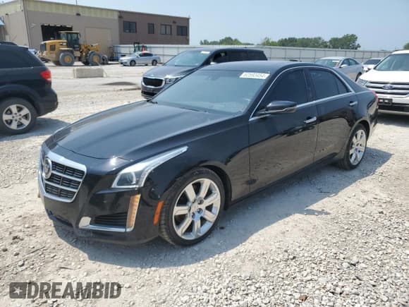 ✅ 2014 Cadillac CTS Premium AWD • VIN: 1G6AZ5S31E0140082 • Lot: 62593454. Listed on Copart with 119,834 mi. Free auction sales archive from the USA and detailed vehicle history report at DreamBid. Image 1.