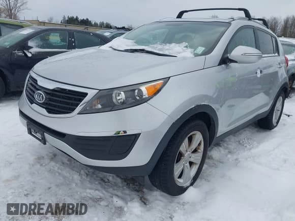 ✅ 2012 Kia Sportage LX • VIN: KNDPB3A23C7323299 • Lot: 43887981. Listed on IAAI with 527,900 mi. Free auction sales archive from the USA and detailed vehicle history report at DreamBid. Image 2.
