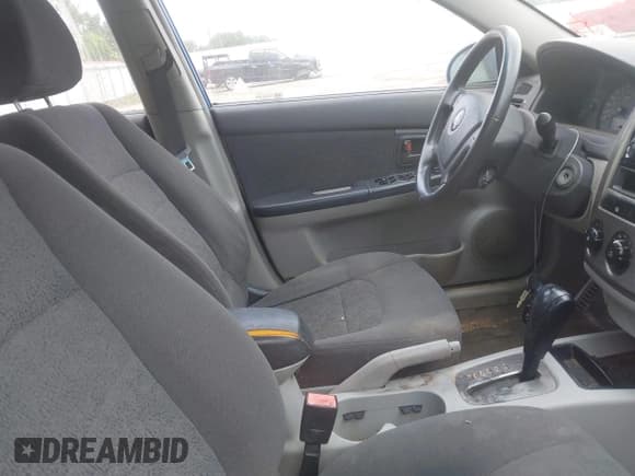 ✅ 2006 Kia Spectra EX • VIN: KNAFE121665235129 • Lot: 42764039. Wystawiony na IAAI z przebiegiem 206 711 mil. Bezpłatny archiwum sprzedaży aukcyjnych z USA i szczegółowy raport historii pojazdu na DreamBid. Zdjęcie 5.