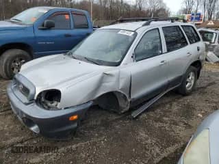 2002 Hyundai Santa Fe GLS z VIN KM8SC73D12U234923, wystawiony jako Copart lot #49967425 z przebiegiem 180 125 mil mil oraz Szkoda całkowita • Salvage title. Historia ofert i sprzedaży dostępna na DreamBid. Obrazek 1.