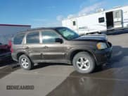 ✅ 2006 Mazda Tribute S • VIN: 4F2YZ94106KM19821 • Lot: 43410710. Listed on IAAI with 178,549 mi. Free auction sales archive from the USA and detailed vehicle history report at DreamBid. Image 14.