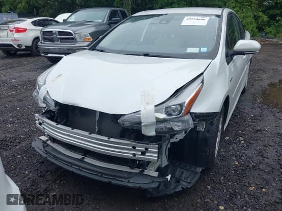 ✅ 2022 Toyota Prius L Eco • VIN: JTDKAMFU2N3167148 • Lot: 42534666. Listed on IAAI with 92,890 mi. Free auction sales archive from the USA and detailed vehicle history report at DreamBid. Image 13.
