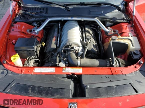 ✅ 2010 Dodge Challenger SRT-8 • VIN: 2B3CJ7DW3AH142519 • Lot: 41775425. Wystawiony na Copart z przebiegiem 84 871 mil. Bezpłatny archiwum sprzedaży aukcyjnych z USA i szczegółowy raport historii pojazdu na DreamBid. Zdjęcie 11.