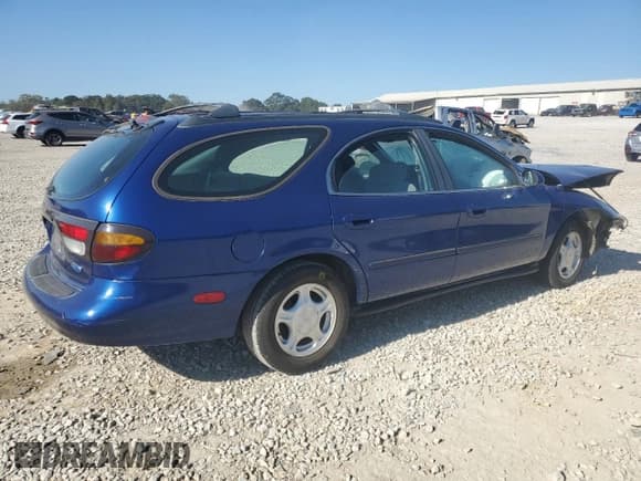 ✅ 1997 Ford Taurus GL • VIN: 1FALP57U2VA153212 • Lot: 75761034. Listed on Copart with 167,802 mi. Free auction sales archive from the USA and detailed vehicle history report at DreamBid. Image 3.