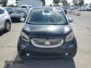 ✅ 2016 Smart fortwo Prime • VIN: WMEFJ5DA3GK073788 • Lot: 85151445. Wystawiony na Copart z przebiegiem 102 443 mil. Bezpłatny archiwum sprzedaży aukcyjnych z USA i szczegółowy raport historii pojazdu na DreamBid. Zdjęcie 5.