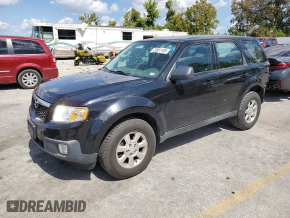 ✅ 2010 Mazda Tribute Sport • VIN: 4F2CY0C72AKM09136 • Lot: 70951185. Listed on Copart with 157,610 mi. Free auction sales archive from the USA and detailed vehicle history report at DreamBid. Image 1.