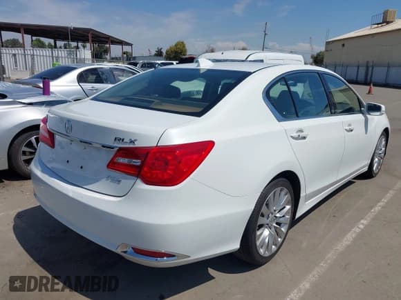 ✅ 2014 Acura RLX Technology • VIN: JH4KC1F58EC001409 • Лот: 43067635. Опубликован ранее на IAAI с пробегом 156 583 миль. Бесплатный доступ к архиву аукционных продаж из США и подробный отчёт об истории автомобиля на DreamBid. Изображение 4.