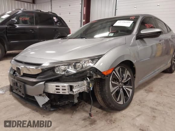 ✅ 2018 Honda Civic EX-T • VIN: JHMFC1F32JX040810 • Lot: 43728209. Wystawiony na IAAI z przebiegiem 65 585 mil. Bezpłatny archiwum sprzedaży aukcyjnych z USA i szczegółowy raport historii pojazdu na DreamBid. Zdjęcie 12.