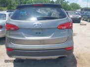 ✅ 2016 Hyundai Santa Fe • VIN: 5XYZT3LB0GG351802 • Lot: 42695517. Wystawiony na IAAI z przebiegiem Nie podano. Bezpłatny archiwum sprzedaży aukcyjnych z USA i szczegółowy raport historii pojazdu na DreamBid. Zdjęcie 16.