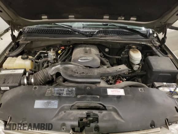 2003 Chevrolet Suburban Z71 z VIN 3GNFK16Z93G197080, wystawiony jako Copart lot #79689684 z przebiegiem 254 809 mil mil oraz Szkoda całkowita • Salvage title. Historia ofert i sprzedaży dostępna na DreamBid. Obrazek 13.