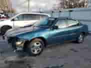 2003 Chevrolet Malibu z VIN 1G1ND52JX3M685885, wystawiony jako Copart lot #86604084 z przebiegiem 136 007 mil mil oraz Szkoda całkowita • Salvage title. Historia ofert i sprzedaży dostępna na DreamBid. Obrazek 1.
