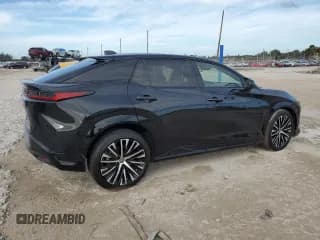 ✅ 2023 Lexus RZ 450e Premium • VIN: JTJAAAAB4PA005937 • Lot: 39939654. Listed on Copart with 6,136 mi. Free auction sales archive from the USA and detailed vehicle history report at DreamBid. Image 3.