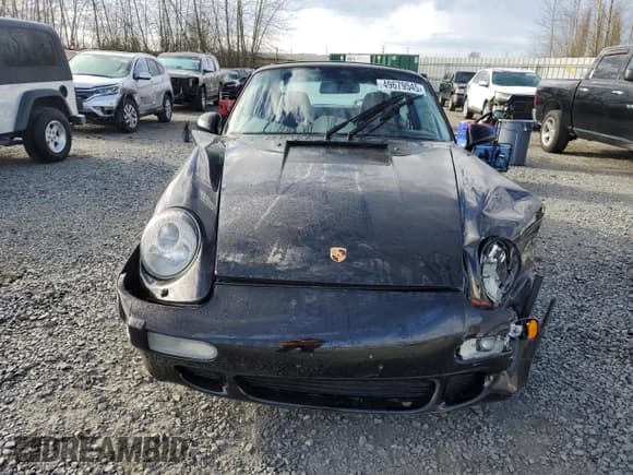 ✅ 1997 Porsche 911 • VIN: WP0AA2990VS320557 • Lot: 49679545. Listed on Copart with 21,380 mi. Free auction sales archive from the USA and detailed vehicle history report at DreamBid. Image 5.