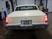 ✅ 1984 Cadillac Eldorado • VIN: 1G6AL5784EE667333 • Lot: 86858435. Listed on Copart with 35,389 mi. Free auction sales archive from the USA and detailed vehicle history report at DreamBid. Image 6.