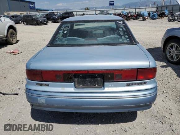 ✅ 1992 Mercury Sable • VIN: 1MECM53U3NG651729 • Lot: 65639255. Wystawiony na Copart z przebiegiem 26 842 mil. Bezpłatny archiwum sprzedaży aukcyjnych z USA i szczegółowy raport historii pojazdu na DreamBid. Zdjęcie 6.