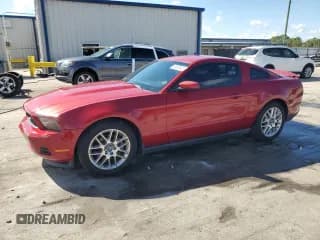 ✅ 2012 Ford Mustang V6 • VIN: 1ZVBP8AM2C5239994 • Lot: 86860525. Listed on Copart with 151,848 mi. Free auction sales archive from the USA and detailed vehicle history report at DreamBid. Image 1.