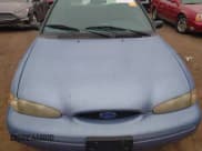 ✅ 1997 Ford Contour LX • VIN: 1FALP653XVK115690 • Lot: 41385332. Wystawiony na IAAI z przebiegiem 102 174 mil. Bezpłatny archiwum sprzedaży aukcyjnych z USA i szczegółowy raport historii pojazdu na DreamBid. Zdjęcie 6.