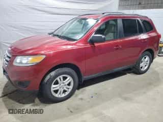 2012 Hyundai Santa Fe GLS z VIN 5XYZGDAB7CG116496, wystawiony jako Copart lot #68695525 z przebiegiem 194 667 mil mil oraz Czysty tytuł • Clean title. Historia ofert i sprzedaży dostępna na DreamBid. Obrazek 1.