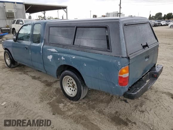 ✅ 1995 Toyota Tacoma • VIN: 4TAUN53B7SZ085250 • Лот: 84213915. Опубликован ранее на Copart с пробегом 242 802 миль. Бесплатный доступ к архиву аукционных продаж из США и подробный отчёт об истории автомобиля на DreamBid. Изображение 2.