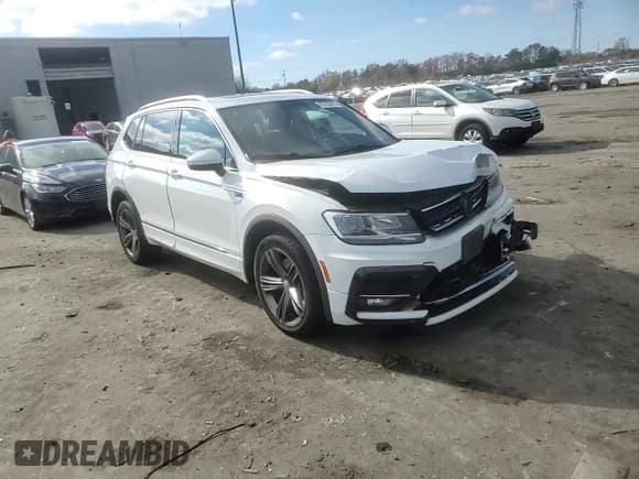 ✅ 2018 Volkswagen Tiguan SEL • VIN: 3VV3B7AX1JM149934 • Lot: 92750675. Listed on Copart with 103,636 mi. Free auction sales archive from the USA and detailed vehicle history report at DreamBid. Image 14.