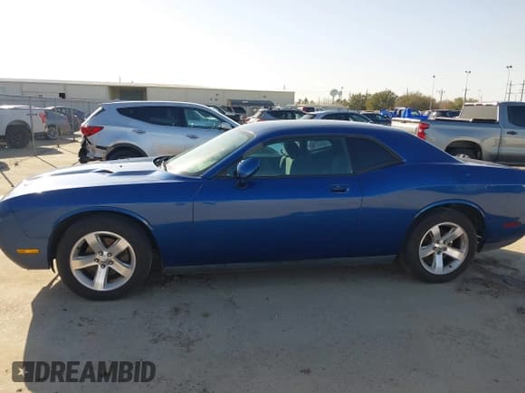 ✅ 2009 Dodge Challenger SE • VIN: 2B3LJ44VX9H612031 • Lot: 41700888. Wystawiony na IAAI z przebiegiem 202 454 mil. Bezpłatny archiwum sprzedaży aukcyjnych z USA i szczegółowy raport historii pojazdu na DreamBid. Zdjęcie 14.