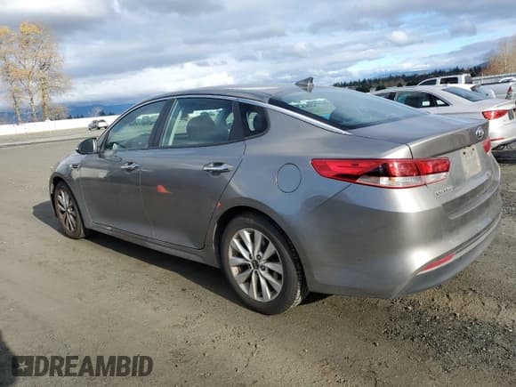 ✅ 2016 Kia Optima LX • VIN: 5XXGT4L3XGG081780 • Lot: 93928205. Listed on Copart with 96,558 mi. Free auction sales archive from the USA and detailed vehicle history report at DreamBid. Image 2.