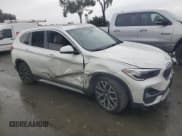 ✅ 2022 BMW X1 xDrive28i • VIN: WBXJG9C02N5V14574 • Lot: 43834285. Listed on Copart with 63,266 mi. Free auction sales archive from the USA and detailed vehicle history report at DreamBid. Image 4.