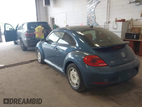 ✅ 2016 Volkswagen Beetle Wolfsburg Edition • VIN: 3VWF17AT8GM633911 • Lot: 42267243. Listed on IAAI with 73,811 mi. Free auction sales archive from the USA and detailed vehicle history report at DreamBid. Image 3.