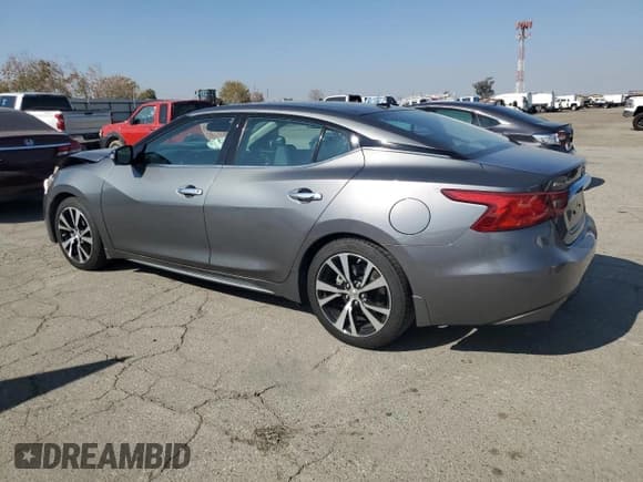 ✅ 2018 Nissan Maxima Platinum • VIN: 1N4AA6AP2JC369240 • Lot: 90403645. Listed on Copart with 72,821 mi. Free auction sales archive from the USA and detailed vehicle history report at DreamBid. Image 2.