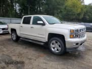 ✅ 2015 Chevrolet Silverado 1500 LTZ • VIN: 3GCUKSECXFG311126 • Lot: 84416175. Listed on Copart with 121,606 mi. Free auction sales archive from the USA and detailed vehicle history report at DreamBid. Image 4.