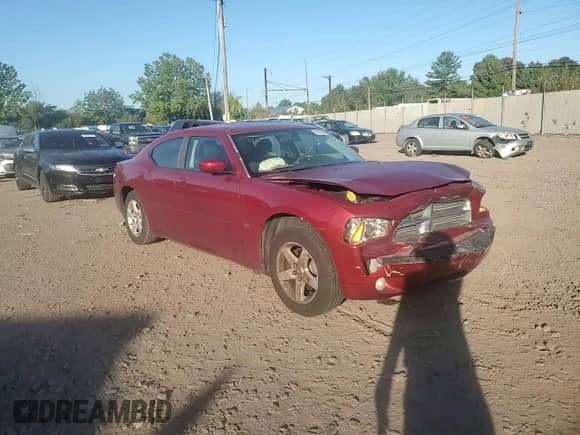 2010 Dodge Charger SXT с VIN 2B3CA3CV0AH186799, выставлен на аукционе Copart как лот 70600884 с пробегом 206 635 миль миль и Списание • Salvage title. История ставок и продаж доступна на DreamBid. Изображение 11.