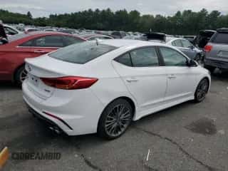 2018 Hyundai Elantra Sport с VIN KMHD04LB5JU723564, выставлен на аукционе Copart как лот 71121095 с пробегом 159 454 миль миль и Списание • Salvage title. История ставок и продаж доступна на DreamBid. Изображение 3.
