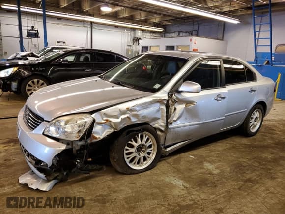 ✅ 2007 Kia Optima LX • VIN: KNAGE123475109066 • Lot: 41294354. Wystawiony na Copart z przebiegiem 134 888 mil. Bezpłatny archiwum sprzedaży aukcyjnych z USA i szczegółowy raport historii pojazdu na DreamBid. Zdjęcie 1.