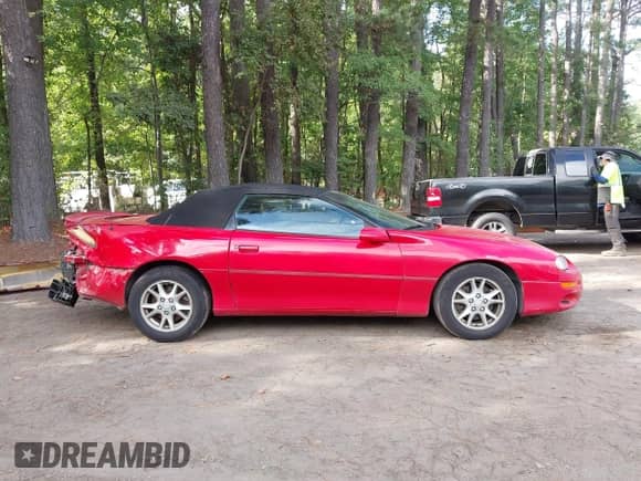 2002 Chevrolet Camaro z VIN 2G1FP32K522138620, wystawiony jako IAAI lot #43319461 z przebiegiem 143 190 mil mil oraz . Historia ofert i sprzedaży dostępna na DreamBid. Obrazek 13.