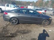 ✅ 2016 Ford Fusion Titanium • VIN: 3FA6P0K96GR140023 • Lot: 43714831. Listed on IAAI with 144,663 mi. Free auction sales archive from the USA and detailed vehicle history report at DreamBid. Image 13.