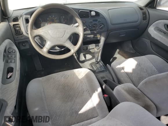 ✅ 2001 Mitsubishi Mirage ES • VIN: JA3AY26CX1U030593 • Lot: 83749264. Listed on Copart with 107,641 mi. Free auction sales archive from the USA and detailed vehicle history report at DreamBid. Image 8.