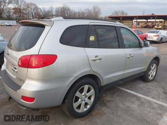 ✅ 2007 Hyundai Santa Fe SE • VIN: 5NMSH73E87H061267 • Lot: 43852443. Listed on IAAI with 377,237 mi. Free auction sales archive from the USA and detailed vehicle history report at DreamBid. Image 4.