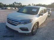 ✅ 2017 Honda Pilot EX-L • VIN: 5FNYF5H7XHB014193 • Lot: 43040443. Listed on IAAI with 246,920 mi. Free auction sales archive from the USA and detailed vehicle history report at DreamBid. Image 2.