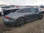 ✅ 2021 Audi RS 7 • VIN: WUAPCBF29MN906721 • Лот: 84500694. Опубликован ранее на Copart с пробегом 31 260 миль. Бесплатный доступ к архиву аукционных продаж из США и подробный отчёт об истории автомобиля на DreamBid. Изображение 3.