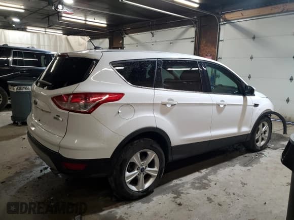 ✅ 2014 Ford Escape SE • VIN: 1FMCU0GX0EUD44198 • Lot: 90415615. Listed on Copart with 140,393 mi. Free auction sales archive from the USA and detailed vehicle history report at DreamBid. Image 3.