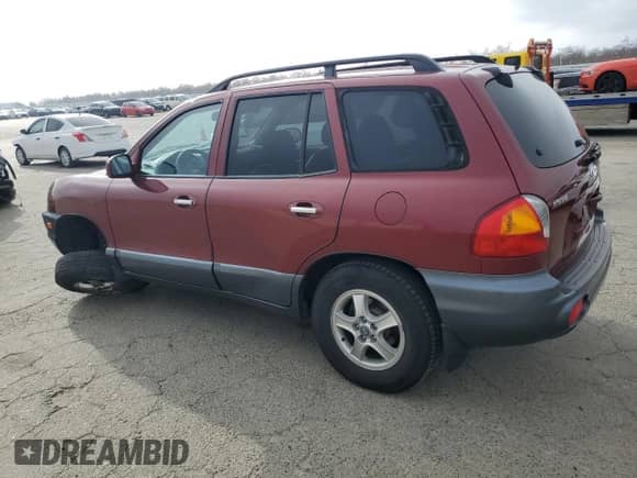 2002 Hyundai Santa Fe GLS z VIN KM8SC13D02U173092, wystawiony jako Copart lot #87683115 z przebiegiem 96 950 mil mil oraz Szkoda całkowita • Salvage title. Historia ofert i sprzedaży dostępna na DreamBid. Obrazek 2.