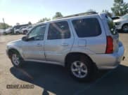 ✅ 2005 Mazda Tribute S • VIN: 4F2CZ96155KM32909 • Lot: 70179055. Listed on Copart with 115,319 mi. Free auction sales archive from the USA and detailed vehicle history report at DreamBid. Image 2.