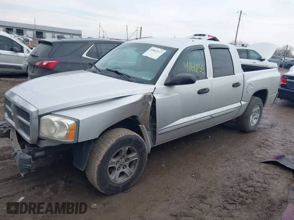 2005 Dodge Dakota Laramie with VIN 1D7HE58N05S244878, listed as a IAAI auction lot 41662513 with 171,323 mi miles and . Bid and sale history available at DreamBid. Image 17.