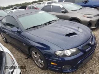 ✅ 2005 Pontiac GTO • VIN: 6G2VX12U15L381992 • Lot: 74657644. Wystawiony na Copart z przebiegiem 21 995 mil. Bezpłatny archiwum sprzedaży aukcyjnych z USA i szczegółowy raport historii pojazdu na DreamBid. Zdjęcie 4.